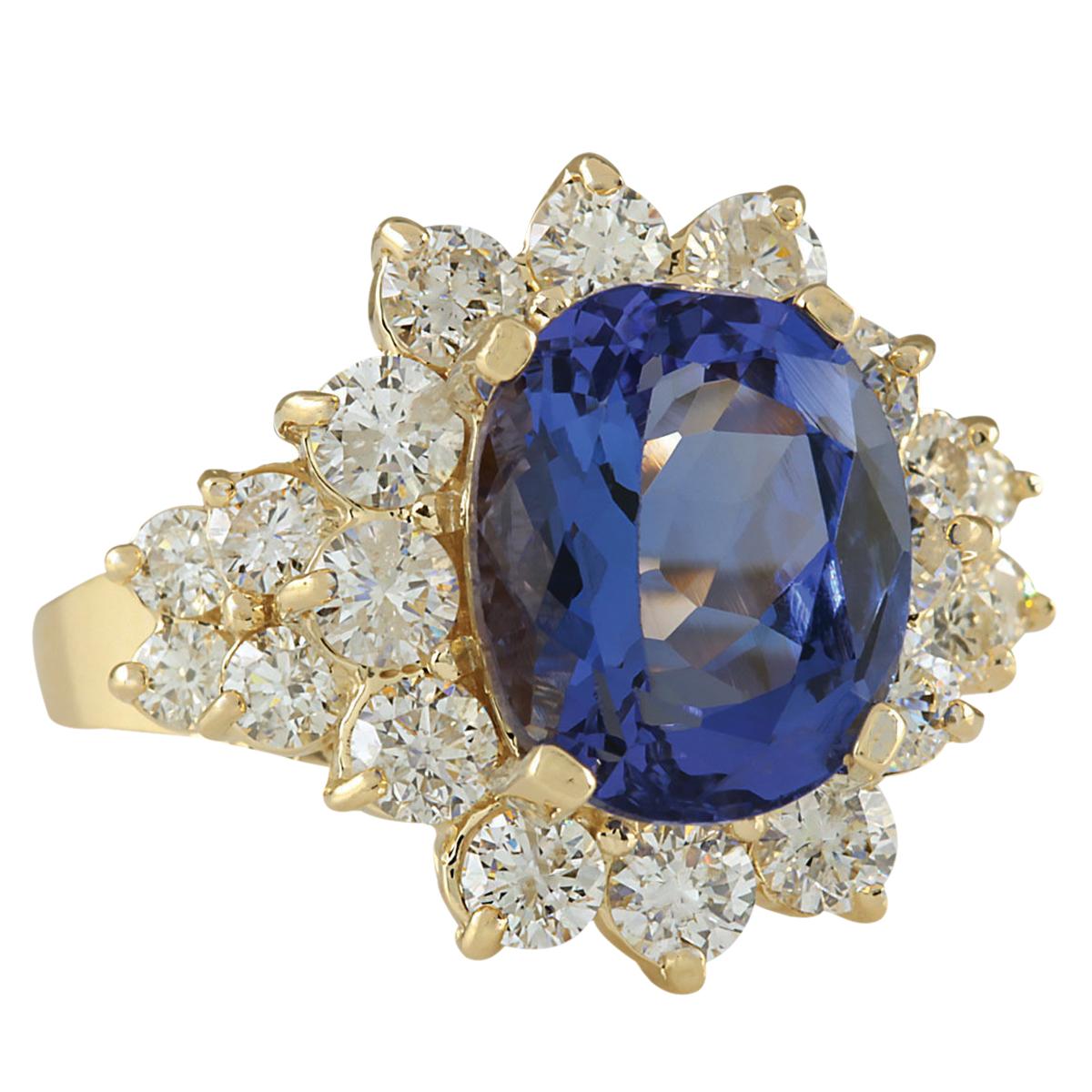 6.75 Carat Tanzanite 14 Karat Yellow Gold Diamond Ring
Stamped: 14K Yellow Gold
Total Ring Weight: 5.1 Grams
Total  Tanzanite Weight is 5.10 Carat (Measures: 11.00x9.00 mm)
Color: Blue
Total  Diamond Weight is 1.65 Carat
Color: F-G, Clarity: