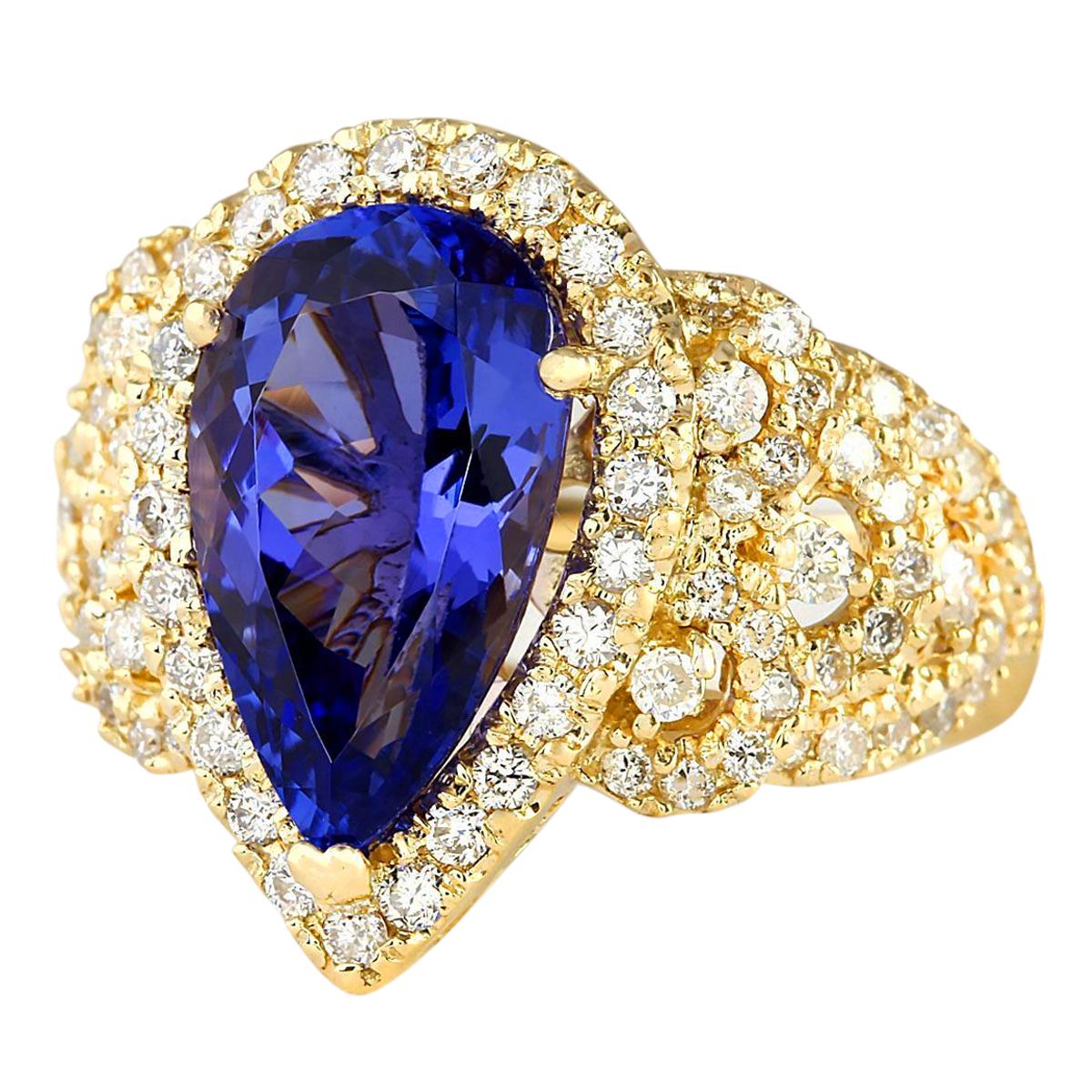6.75 Carat Tanzanite 14 Karat Yellow Gold Diamond Ring
Stamped: 14K Yellow Gold
Total Ring Weight: 10.0 Grams
Total  Tanzanite Weight is 5.35 Carat (Measures: 15.00x9.00 mm)
Color: Blue
 Total  Diamond Weight is 1.40 Carat
Color: F-G, Clarity: