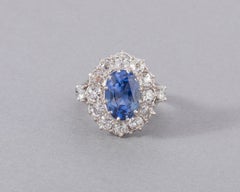 Certified 6.78 Carats Sapphire and 2 Carats Diamonds French Vintage Ring