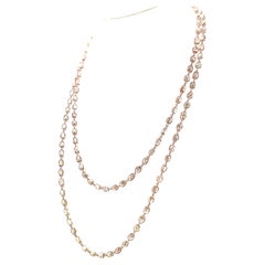 Collier en or rose 18 carats serti d'un diamant brun briolette de 67,74 carats