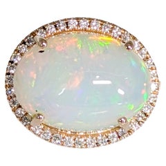 Opale etiope 6,77 con diamante naturale aureolato in oro massiccio 14K OV 15x12mm