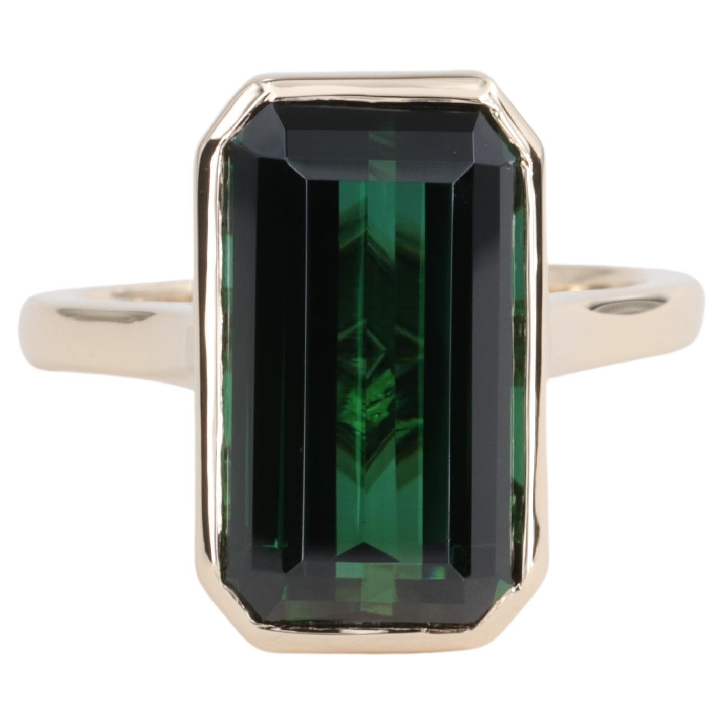 6.78 Carat Green Tourmaline Emerald Cut Bezel Set Yellow Gold Ring For Sale