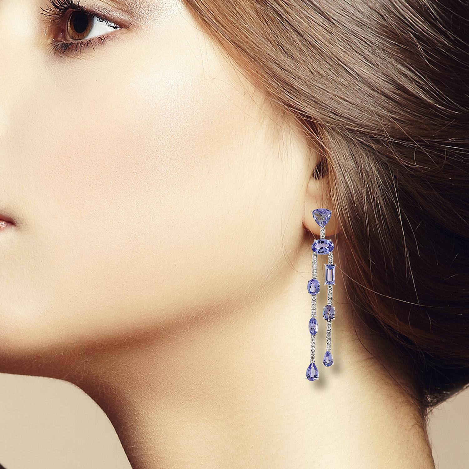 Cast from 14-karat gold, these beautiful earrings are hand set with 6.78 carats tanzanite and .49 carats of sparkling diamonds. 

FOLLOW  MEGHNA JEWELS storefront to view the latest collection & exclusive pieces.  Meghna Jewels is proudly rated as a