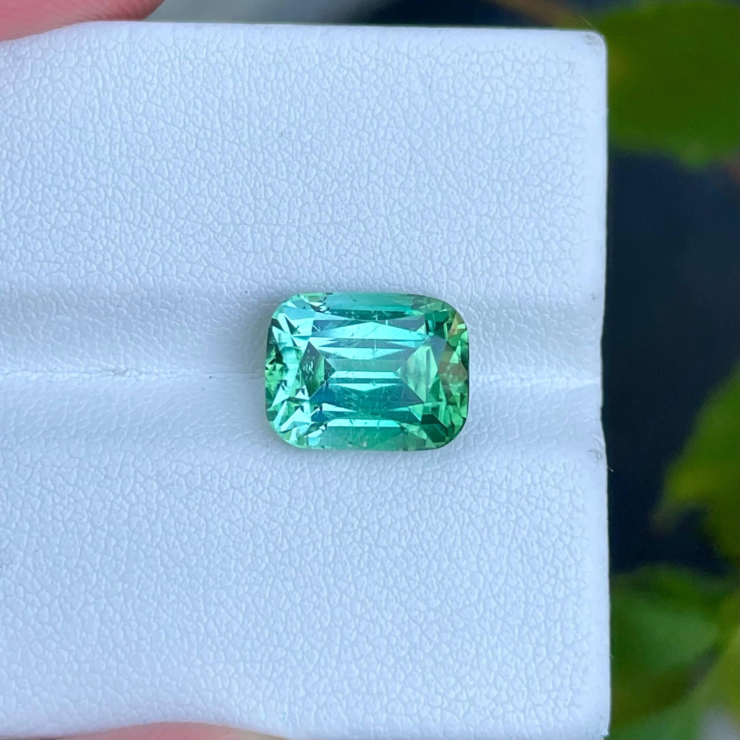 Women's or Men's 6.78 carats Loose Mint Green Tourmaline Step Cushion Cut Natural Afghan Gemstone For Sale