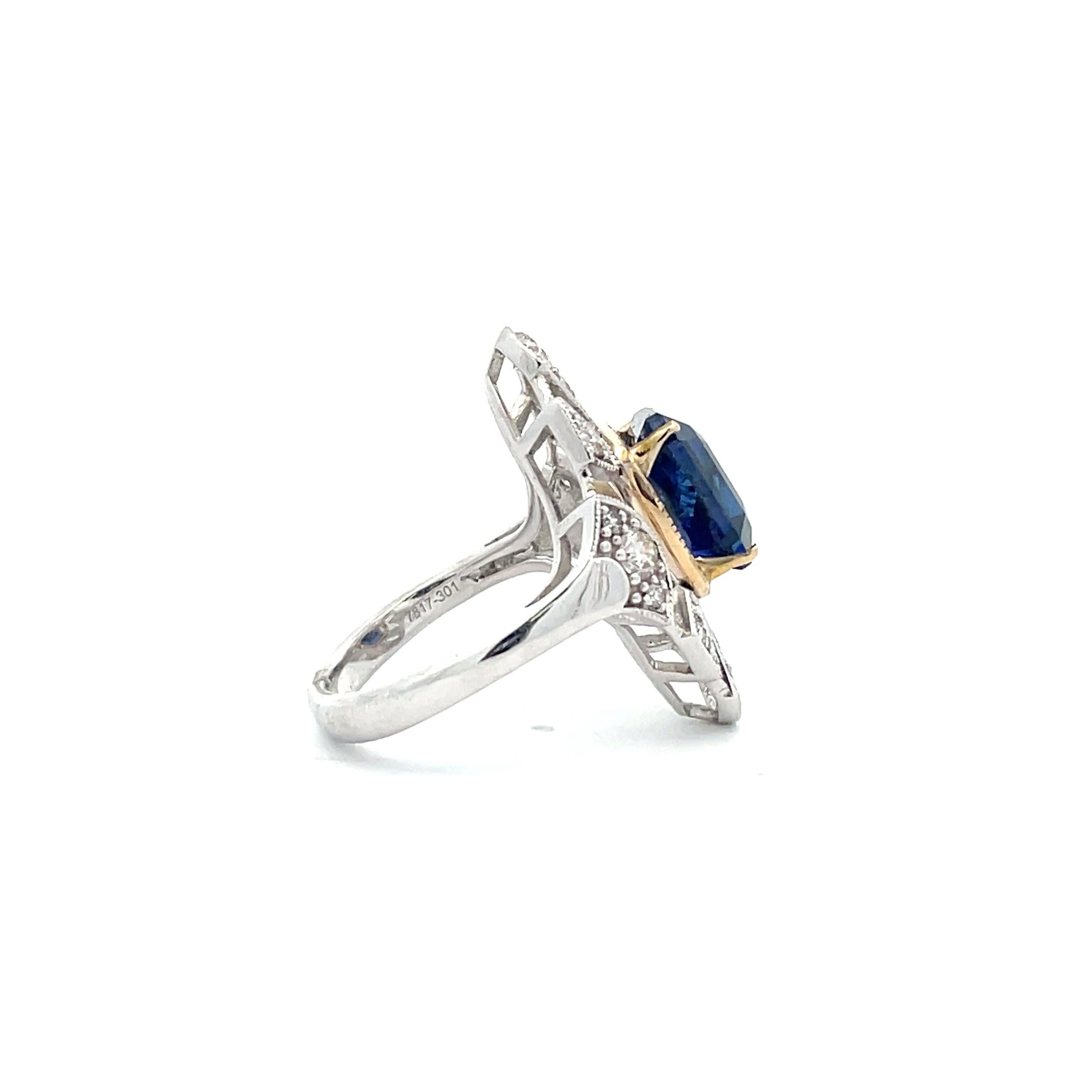A true symbol of love, the majestic Sapphire ring features a 6.78 ct. cushion-cut center stone surrounded by an elegant diamond halo. Crafted by one of our professional artisans, this elegant ring is handcrafted with 14K White Gold and Yellow Gold