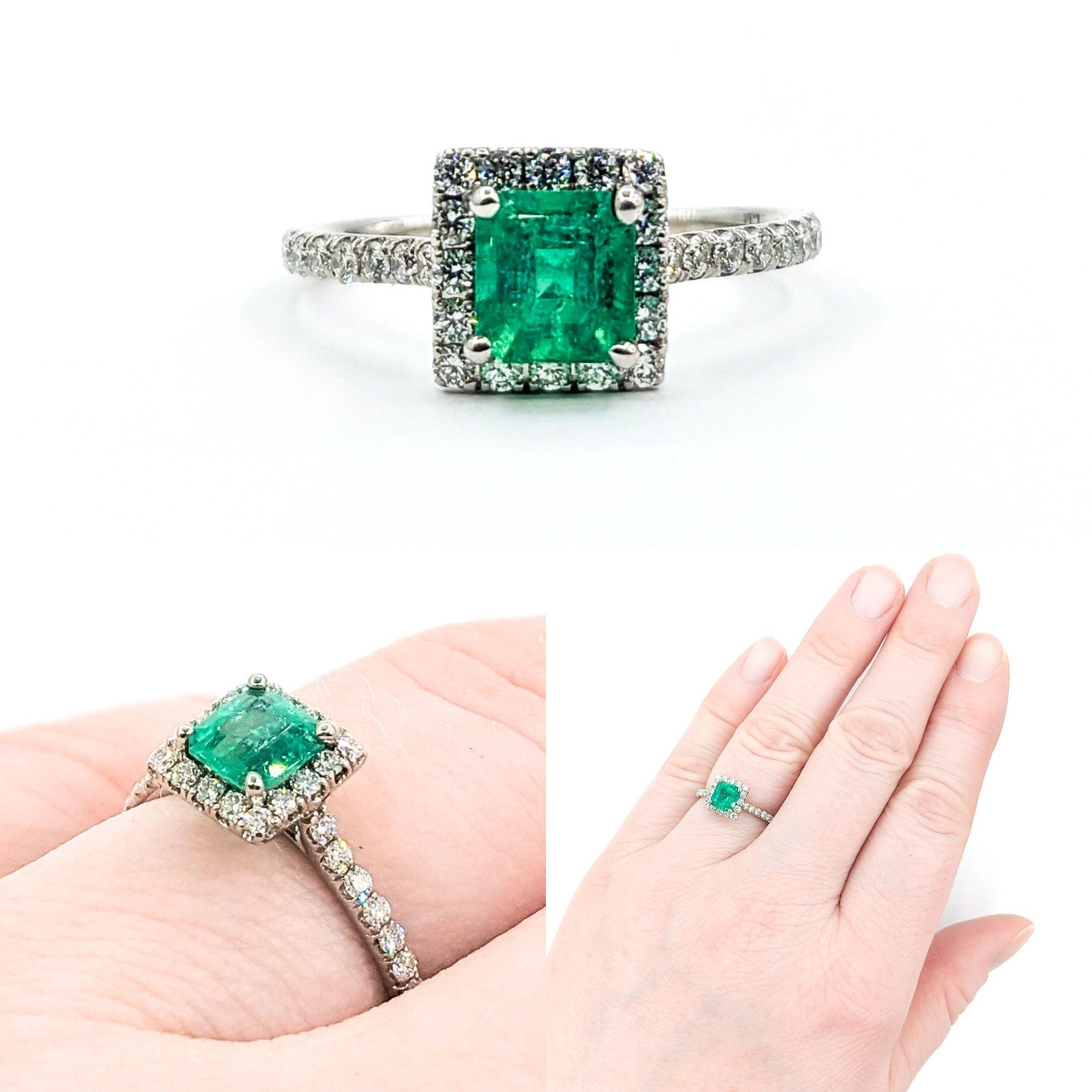 .67ct Colombian GIA Emerald & Diamond Halo Ring In White Gold

Presenting a stunning Emerald Ring, finely crafted in 18k white gold. This exquisite piece highlights a .67ct Colombian Emerald, beautifully complemented by .40ctw diamonds. The Emerald