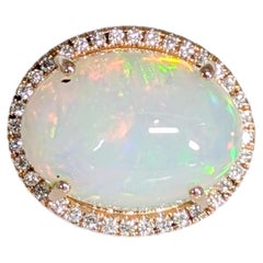 6.7Ct Ethiopian Opal Ring with Natural Diamond Halo: Solid 14K Gold, 15x12mm