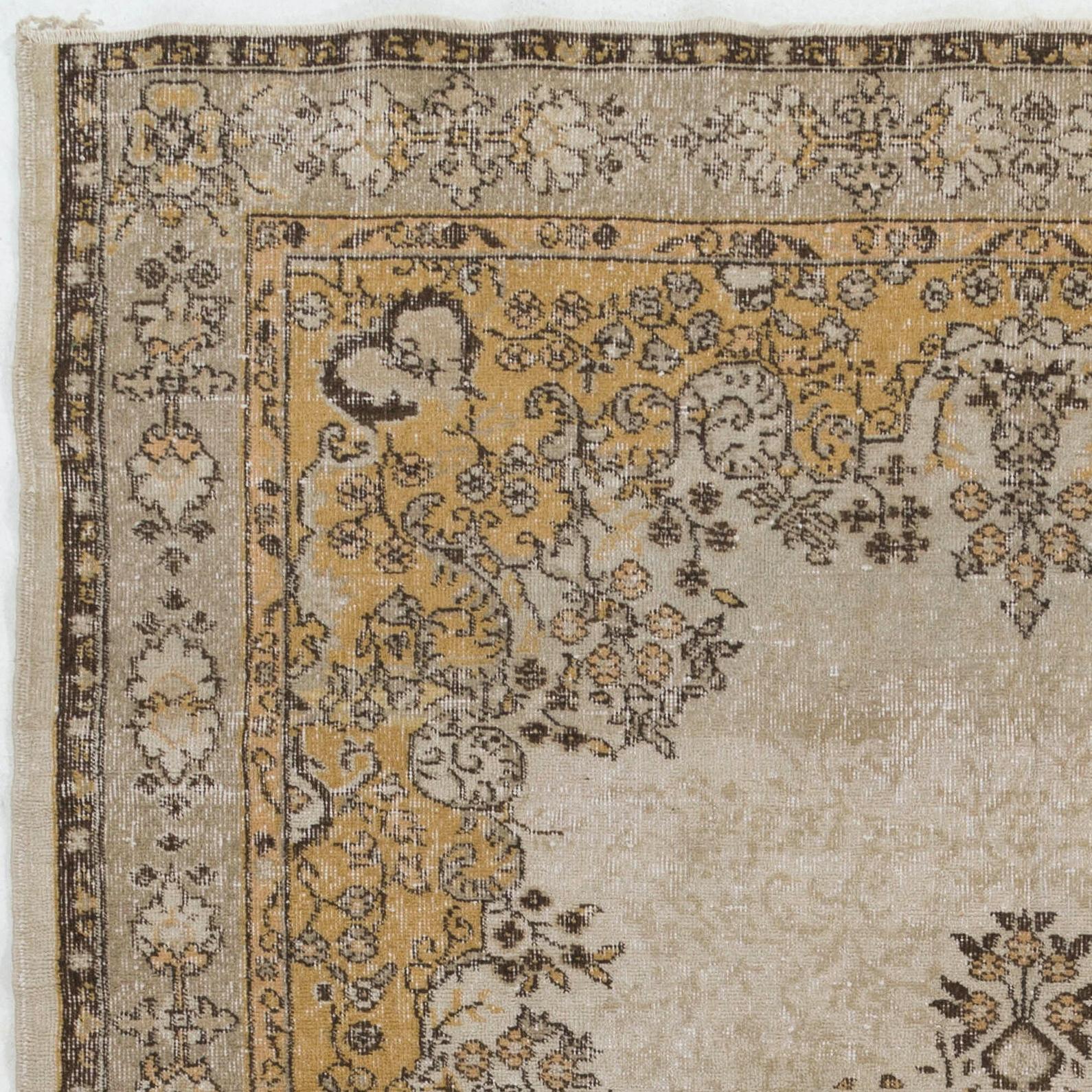 A finely hand-knotted vintage Turkish carpet from 1960s featuring an ever popular European garden design with flowers, branches, blossoms, spandrels and ornaments.
The rug has even low wool pile on cotton foundation. It is heavy and lays flat on the