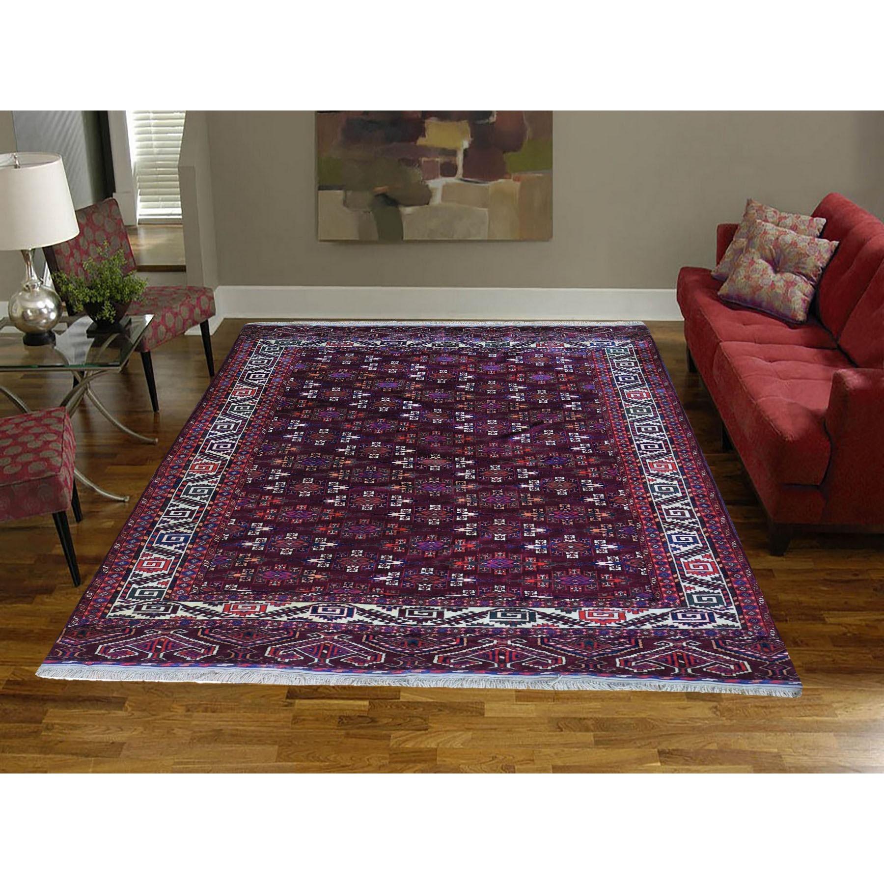 This is a truly genuine one-of-a-kind Red Vintage Turkoman Yomut Bokara Main Rug 300 KPSI Soft and Supple Pure Wool Hand Knotted Clean Oriental. It has been woven for months and months in the centuries-old Persian weaving craftsmanship techniques by