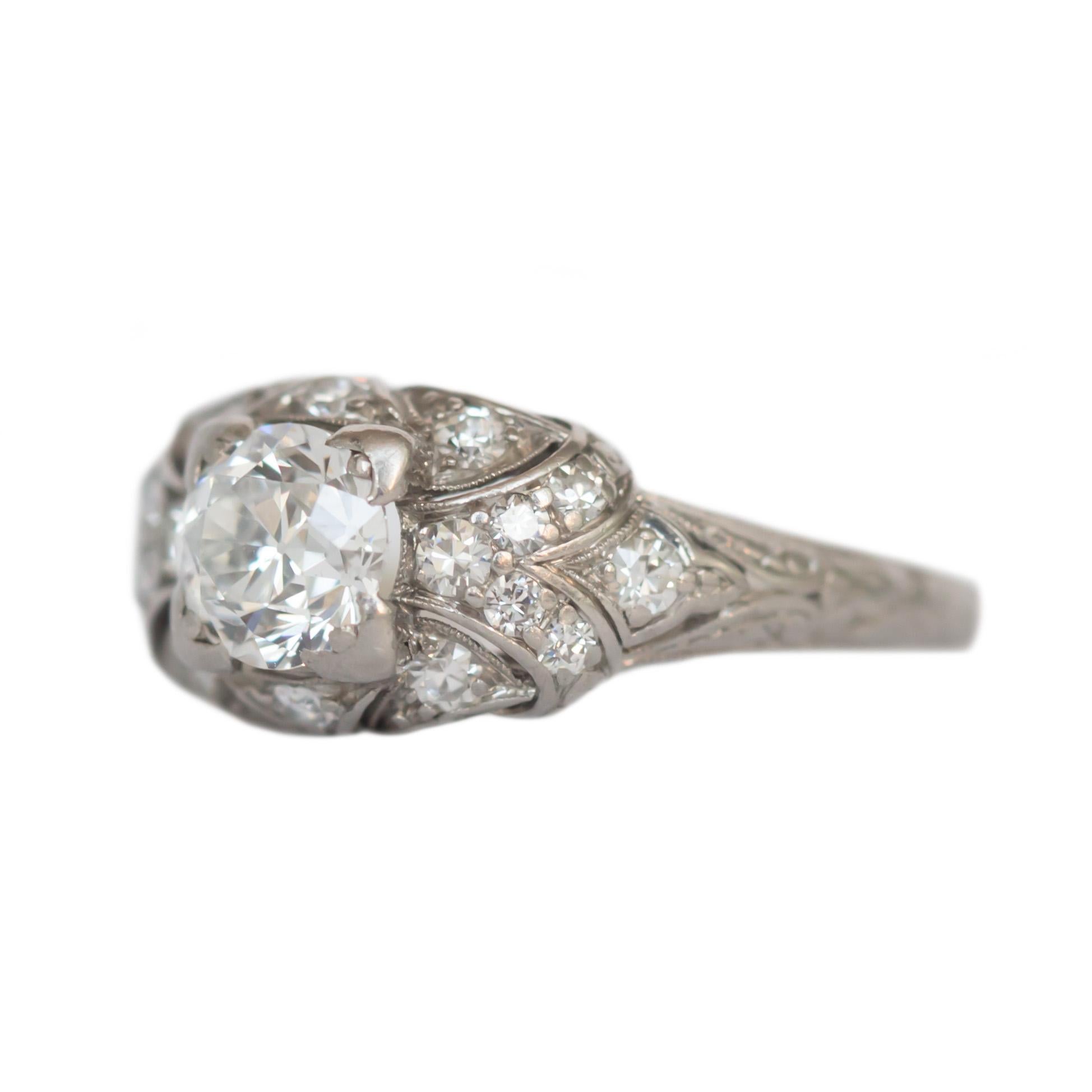 Ring Size: 7.75
Metal Type: Platinum [Hallmarked, and Tested]
Weight: 3.5 grams

Center Diamond Details:
Weight: .68 carat
Cut: Old European Brilliant
Color: I
Clarity: VS1 

Side Diamond Details:
Weight: .20 carat, total weight
Cut: Antique Single