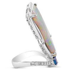 6.8 carats Australian Opal ''Head Turner'' 18K Ring With Diamond and Sapphire