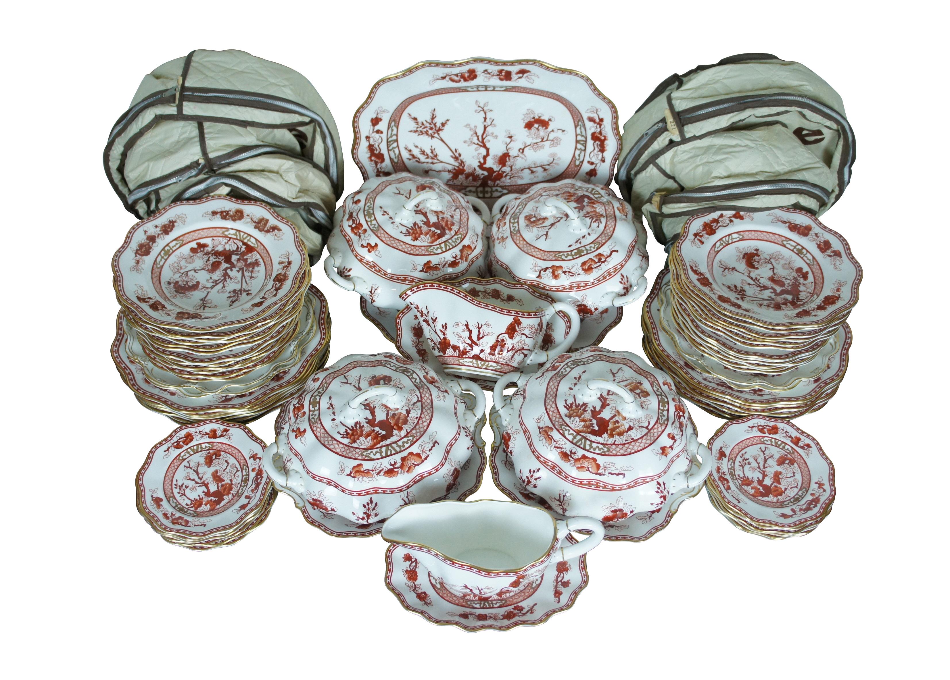 Vintage 68 piece lot of Coalport Bone China dinnerware in the Indian Tree Coral pattern. First produced by Coalport on 1801, features scalloped / gilt edges and a Chinoiserie inspired design of trees and flowers in dark coral / rust red. Circa