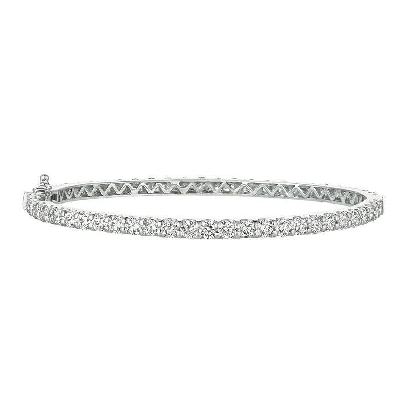 6.80 Carat Natural Diamond Bangle Bracelet 14K White Gold 7''

100% Natural Diamonds, Not Enhanced in any way Round Cut Diamond Bracelet 
6.80CT
G-H 
SI  
14K White Gold,  Prong Style   10.6 gram
1/8 inch in width
56 diamonds

G4767-6WD
ALL OUR