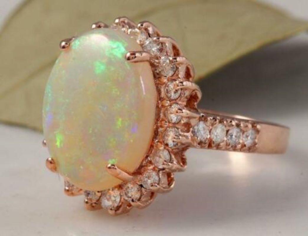 6.80 Carats Natural Impressive Australian Opal and Diamond 14K Solid Rose Gold Ring

Amazing play of colors opal. Pictures don't show the beauty of the opal.

Total Natural Opal Weight is: Approx. 5.50 Carats

Opal Measures: Approx. 15.00 x