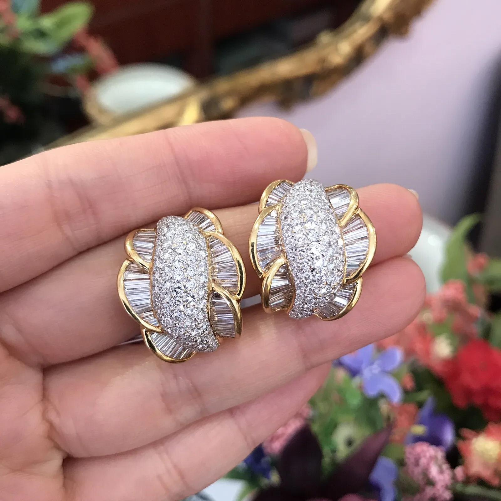 Baguette and Pave Diamond Half Hoop Earrings in 18k Yellow Gold 6.81 Carat Total Weight

Pave Diamond and Baguette Diamond Earrings features Center section of Round Brilliant cut Diamonds Pave set flanked by rows of Baguette Diamonds set in 18k