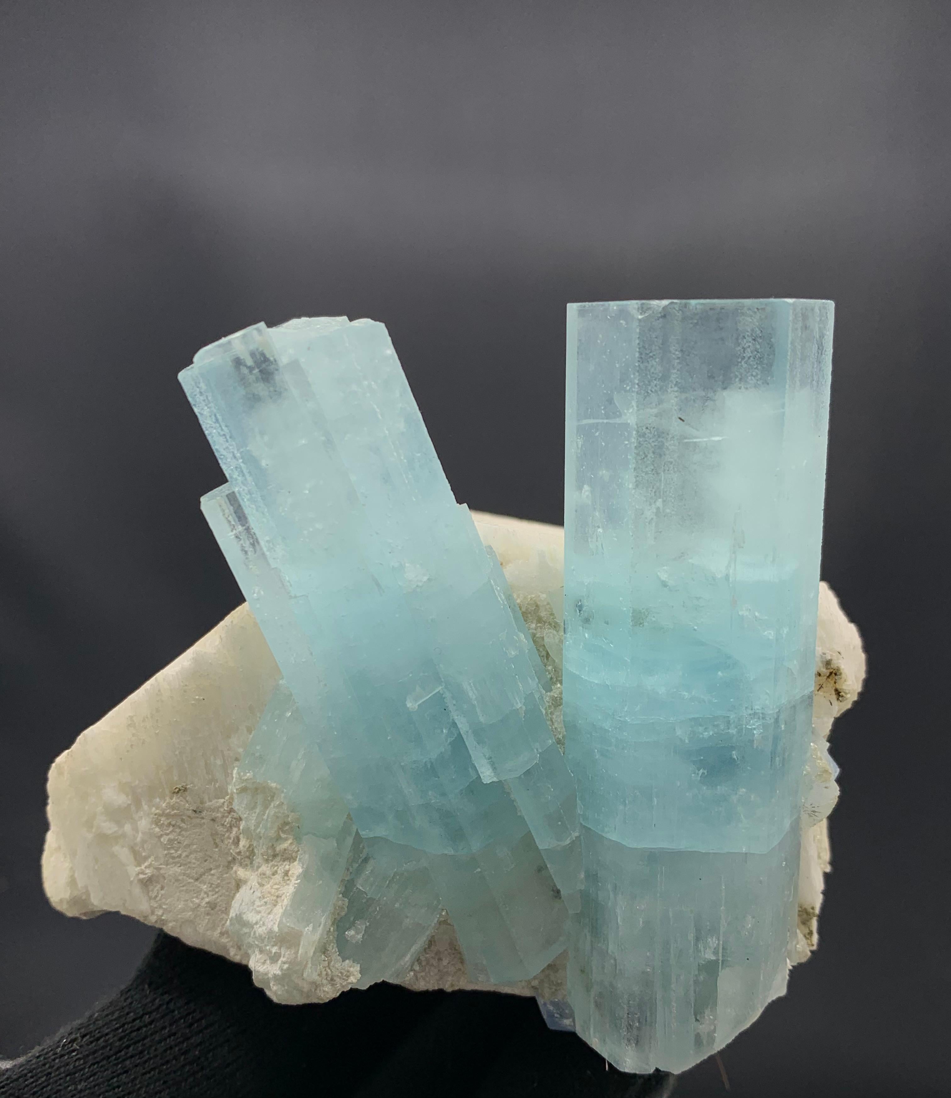 681.51 Gram Pretty Dual Aquamarine Crystal Attached With Feldspar From Pakistan 

Weight: 681.51 Gram
Dimension: 8.1 x 8.7 x 7.2 Cm
Origin: Shigar Valley, Skardu District, Gilgit Baltistan Province, Pakistan

Aquamarine is a pale-blue to light-green