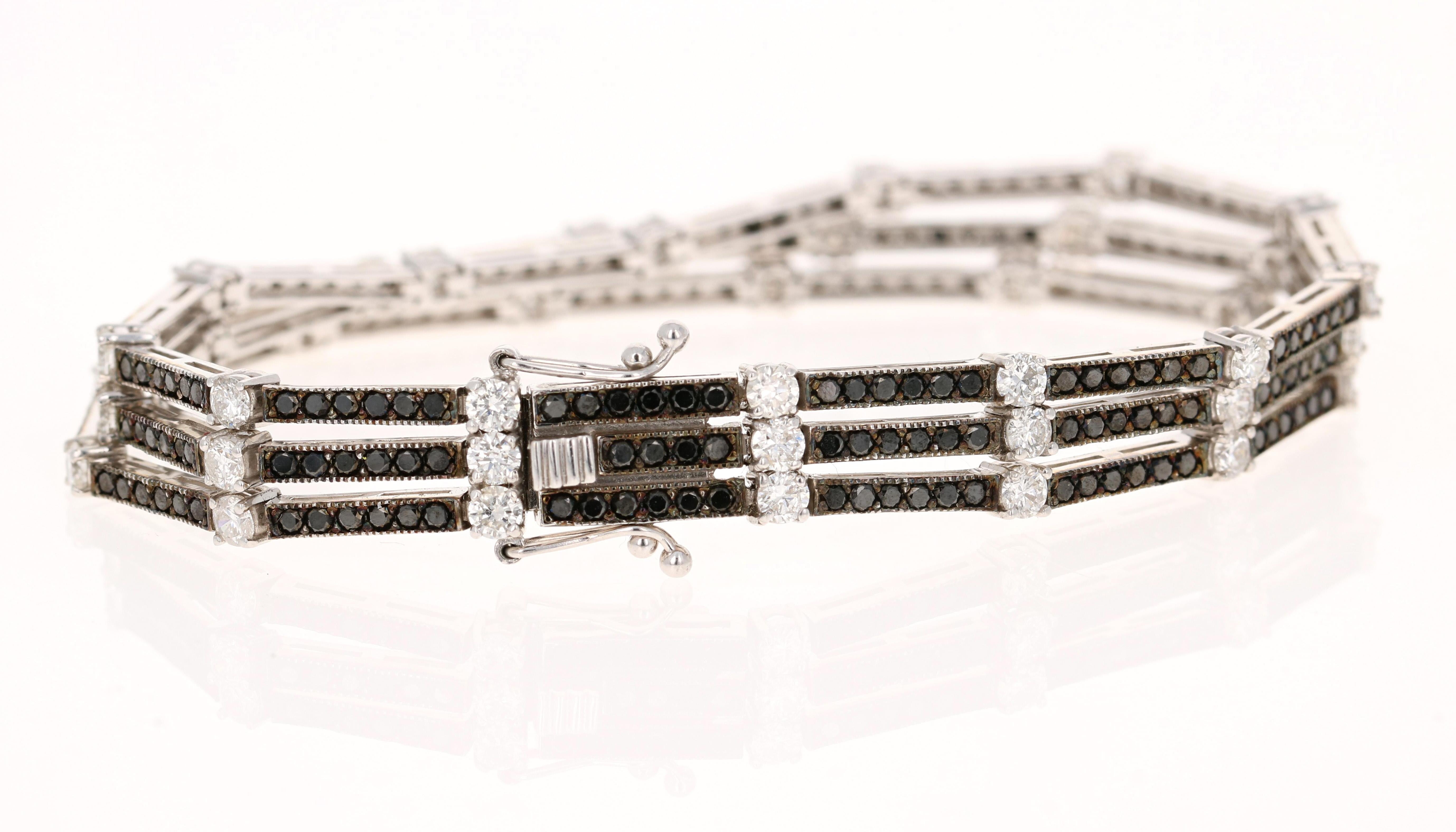 This bracelet has 233 Black Round Cut Diamonds that weigh 3.74 carats and 39 Round Cut Diamonds that weigh 3.08 carats. The total carat weight of the ring is 6.82 carats.

It is set in 14 Karat White Gold and has an approximate gold gram of 18.4
