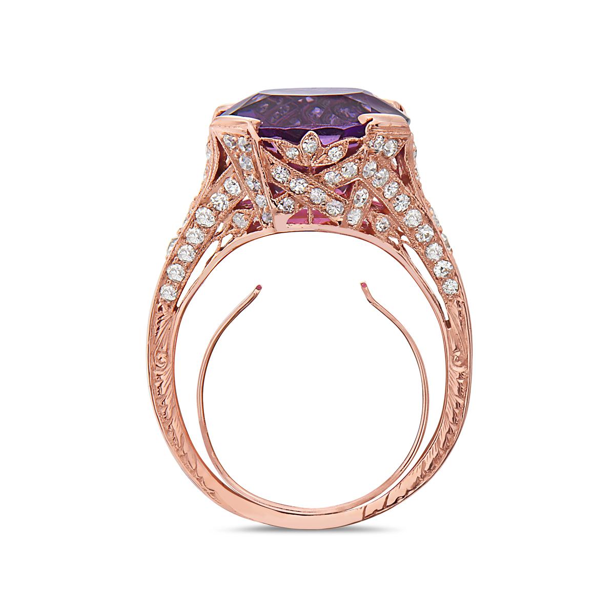 This standout engagement ring features a 6.82 carat amethyst stone set in rose gold filigree surrounded by diamonds. Adjustable sizing. Made in USA.
Viewings available in our NYC showroom. 