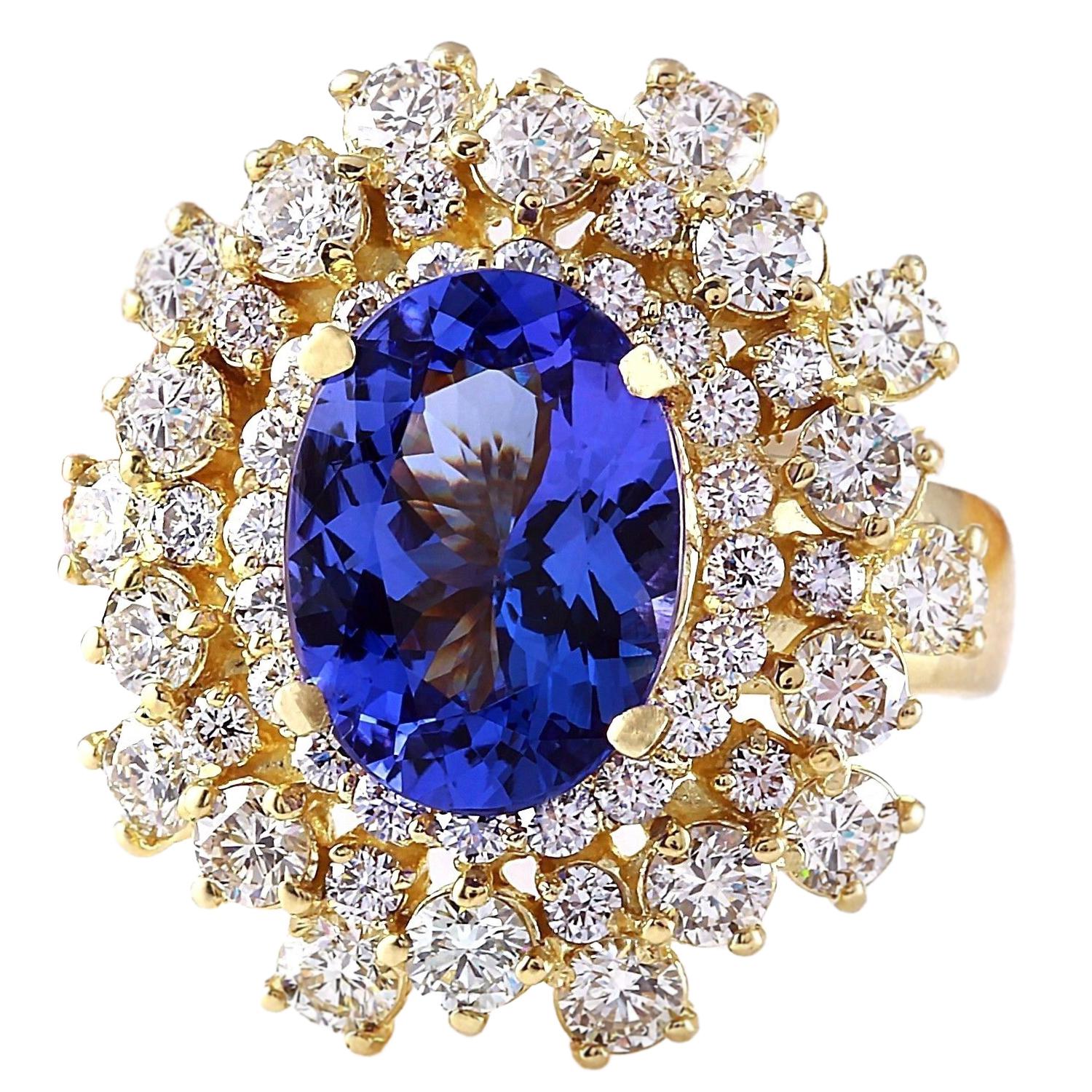Immerse yourself in the captivating allure of this Tanzanite Diamond Cocktail Ring, a true embodiment of luxury and sophistication. Crafted in solid 14K Yellow Gold, this ring boasts a remarkable 6.82 carats.

At its center stage, a breathtaking