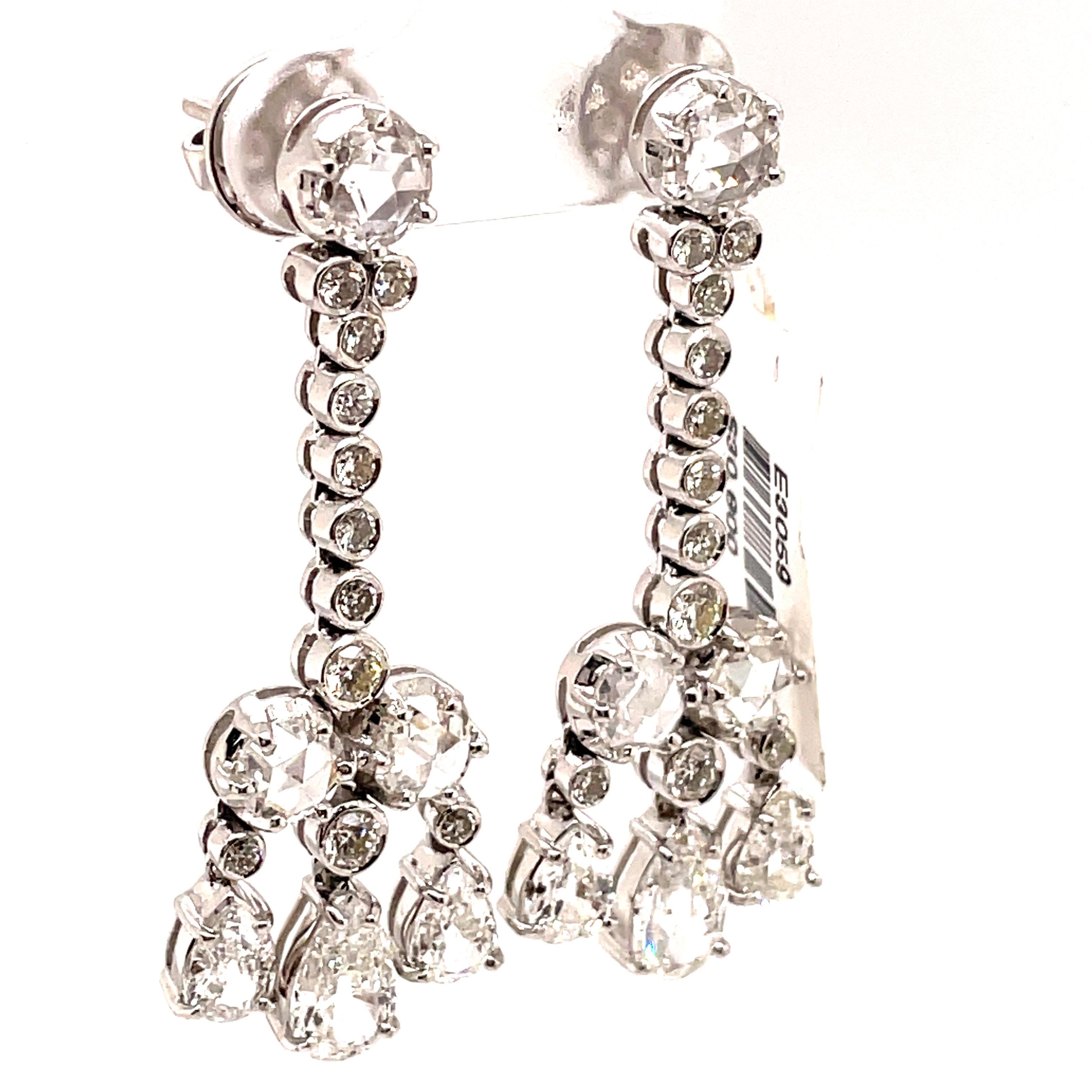 Contemporary 6.82ct Pear, Rose Cut, & Round Diamond Chandelier Earrings 18k White Gold For Sale