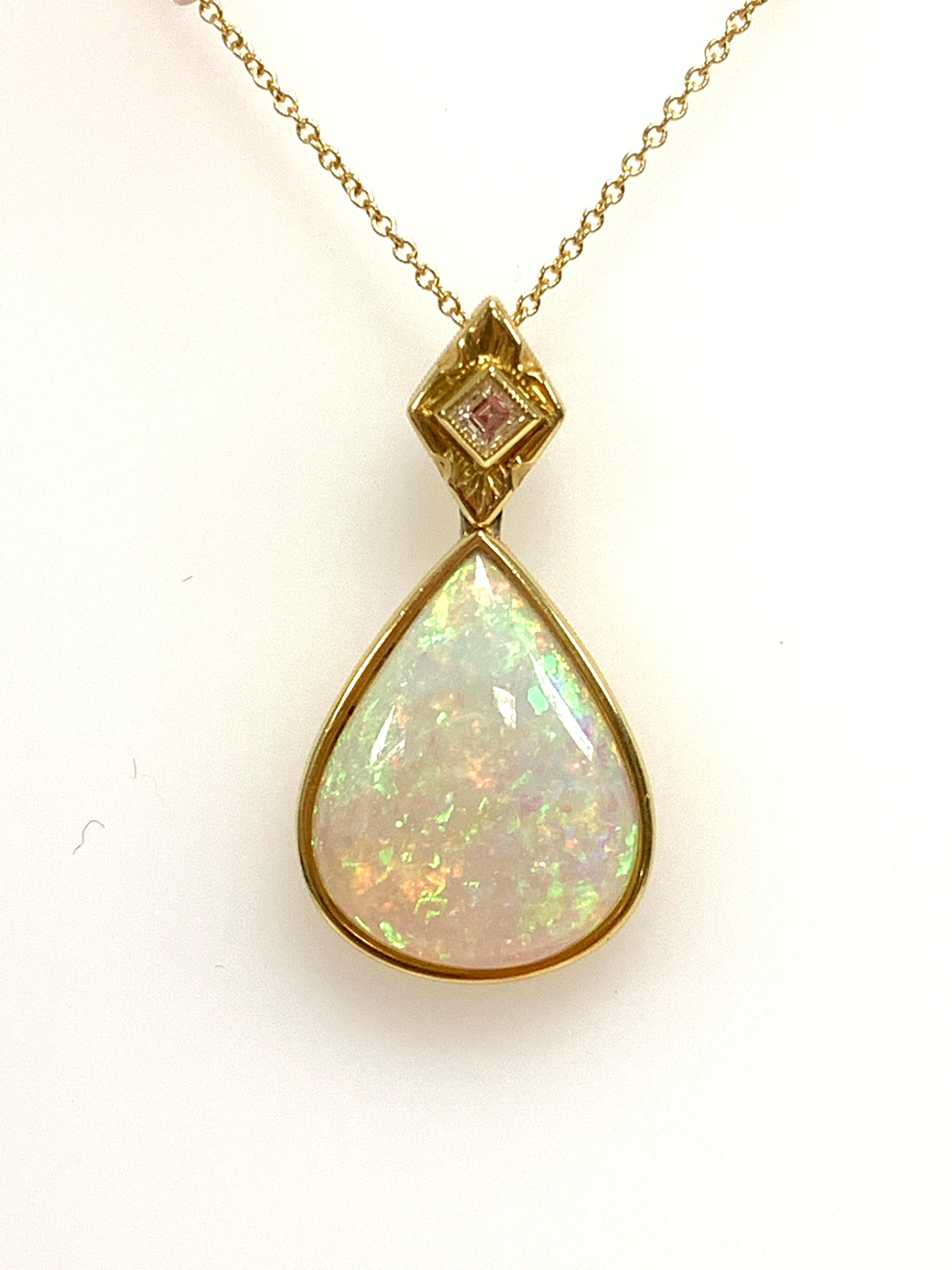 This pear-shaped opal pendant is a natural kaleidoscope of color! The multicolored 