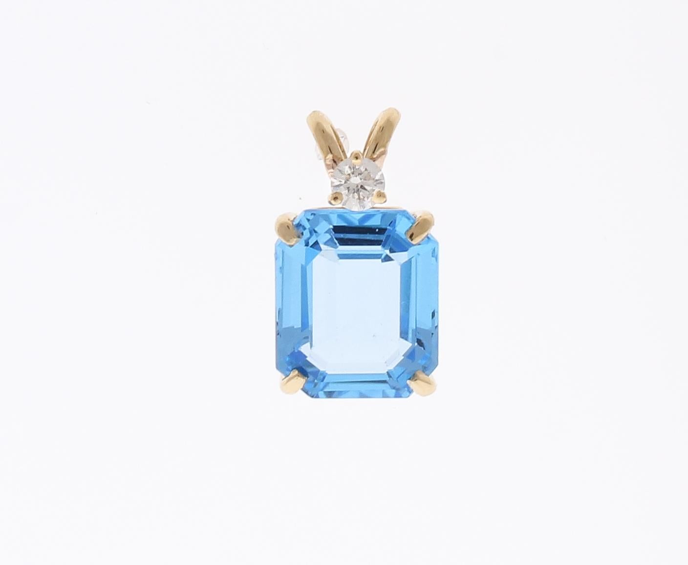 6.84 Carat Emerald Cut Swiss Blue Topaz and Diamond Pendant in 14 Karat Gold In New Condition In Chicago, IL
