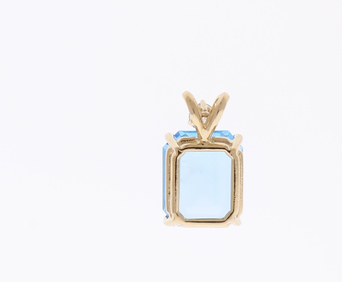 Women's 6.84 Carat Emerald Cut Swiss Blue Topaz and Diamond Pendant in 14 Karat Gold