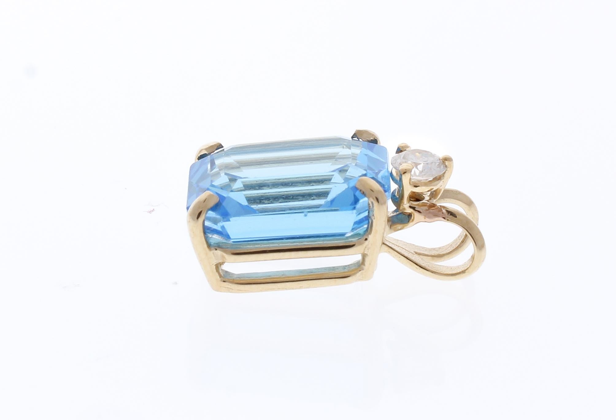 6.84 Carat Emerald Cut Swiss Blue Topaz and Diamond Pendant in 14 Karat Gold 2