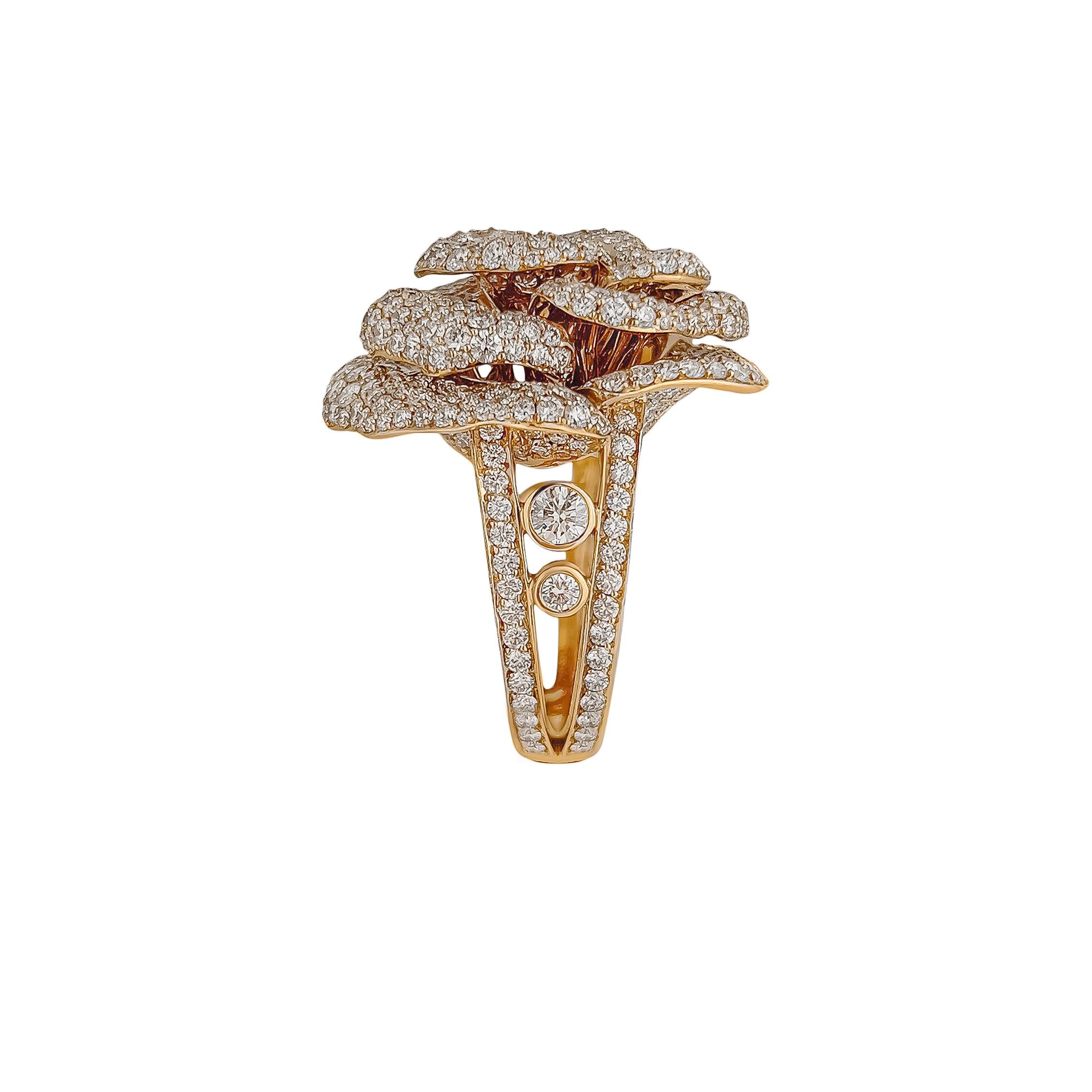 Feminine and delicate like a rose, this 18k pink gold ring is finely set with an impressive 6.84 carats of VVS diamonds. Every detail of the ring is set with pave’d diamonds including each petal inside and under. A 3.20 mm and a 2.10mm diamond