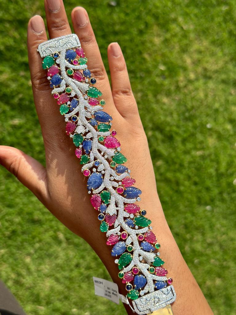Mixed Cut Statement 68.50 Carats Emerald Ruby Sapphire Bracelet in 18kt Solid White Gold For Sale