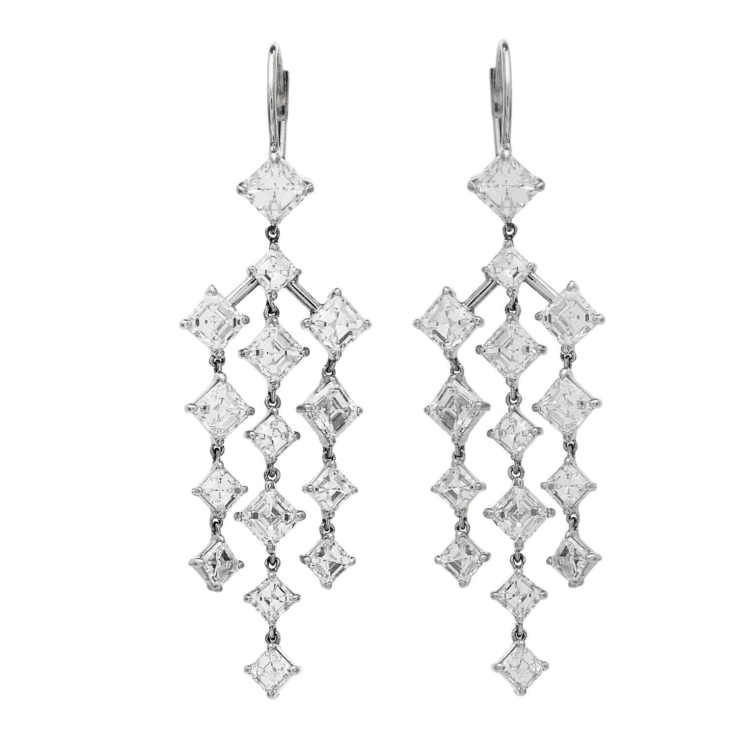 Sparkle Free Movement Drop Chandelier Earrings,

  These fancy earrings are crafted in 18 Karat White Gold. 

They hold approximately 30 genuine Asscher Cut Diamonds, prong set, of 6.85  carats, F-G color, and VS clarity. 

There are Lever Backs