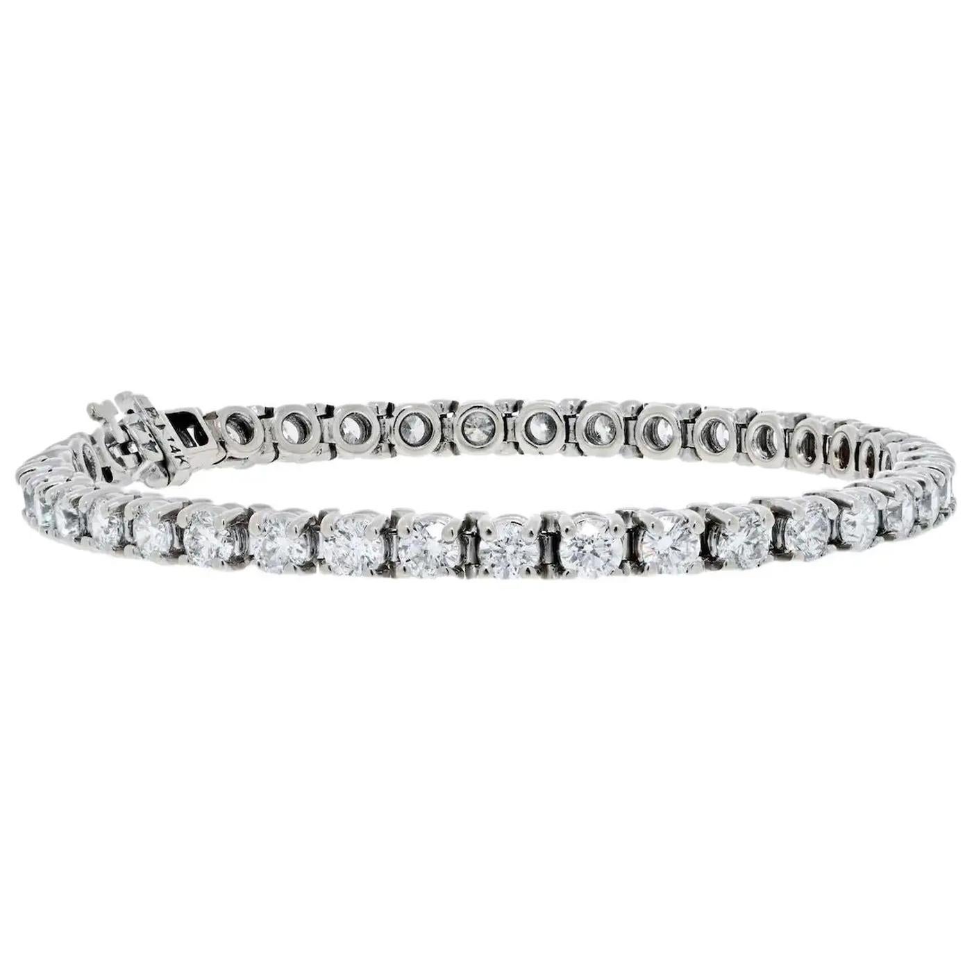 Tennis bracelet that every woman desires. This bracelet makes a beautiful mother for the bride or a bridal gift. Mounted in 14K White Gold finish that gives it a stunning shiny look that lasts for many years with 42 Round Cut Diamonds of 6.85ctw. It