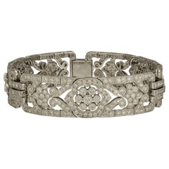 6.86 Carat Diamond Bracelet with Floral Accents 6.86 Carat Diamond Bracelet with Floral Accents