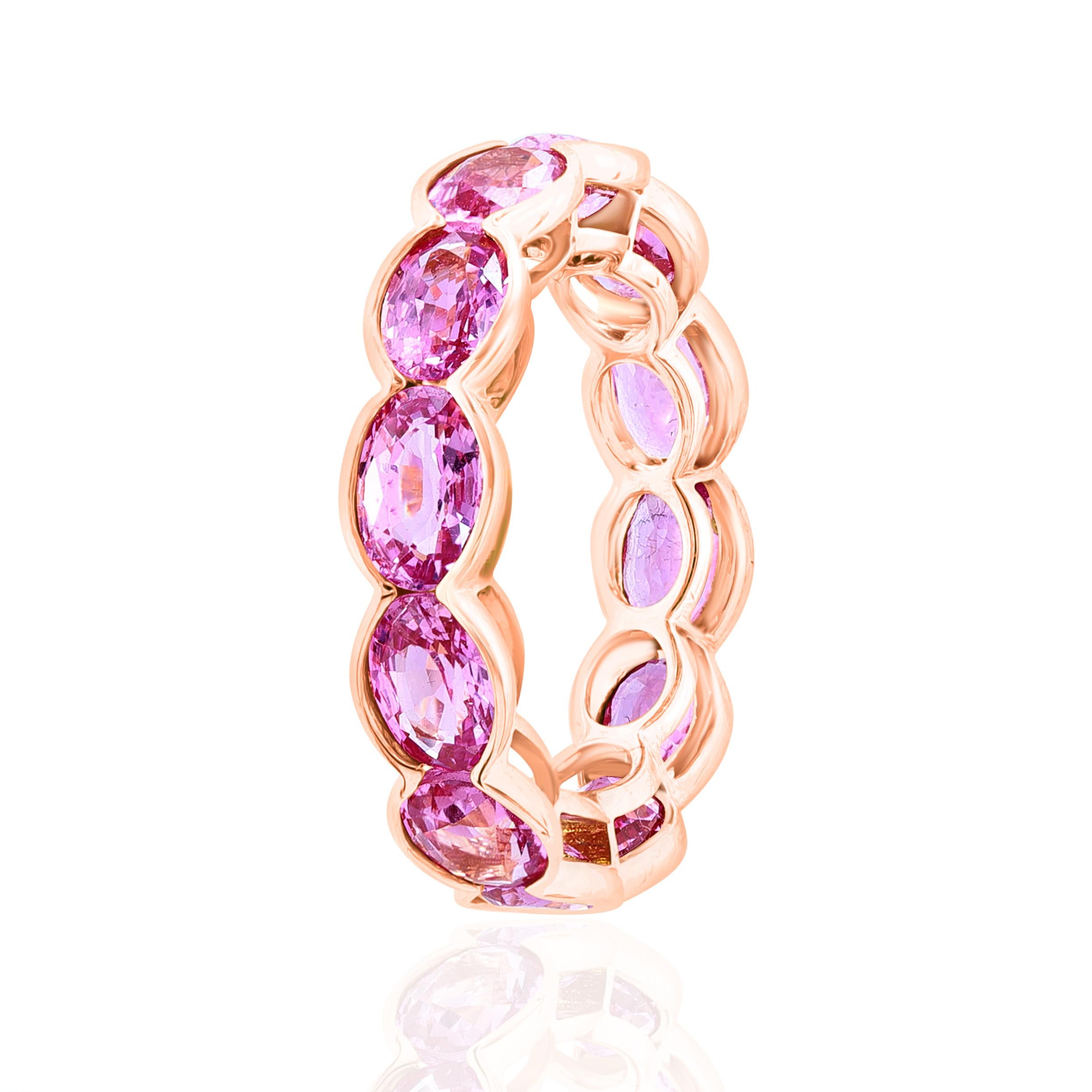 Beautiful and Forward Eternity Band.
Ring features 12 perfectly matched Pink Sapphires weighing 6.86 Carats.
Set in 18 Karat Rose Gold.
Size 6