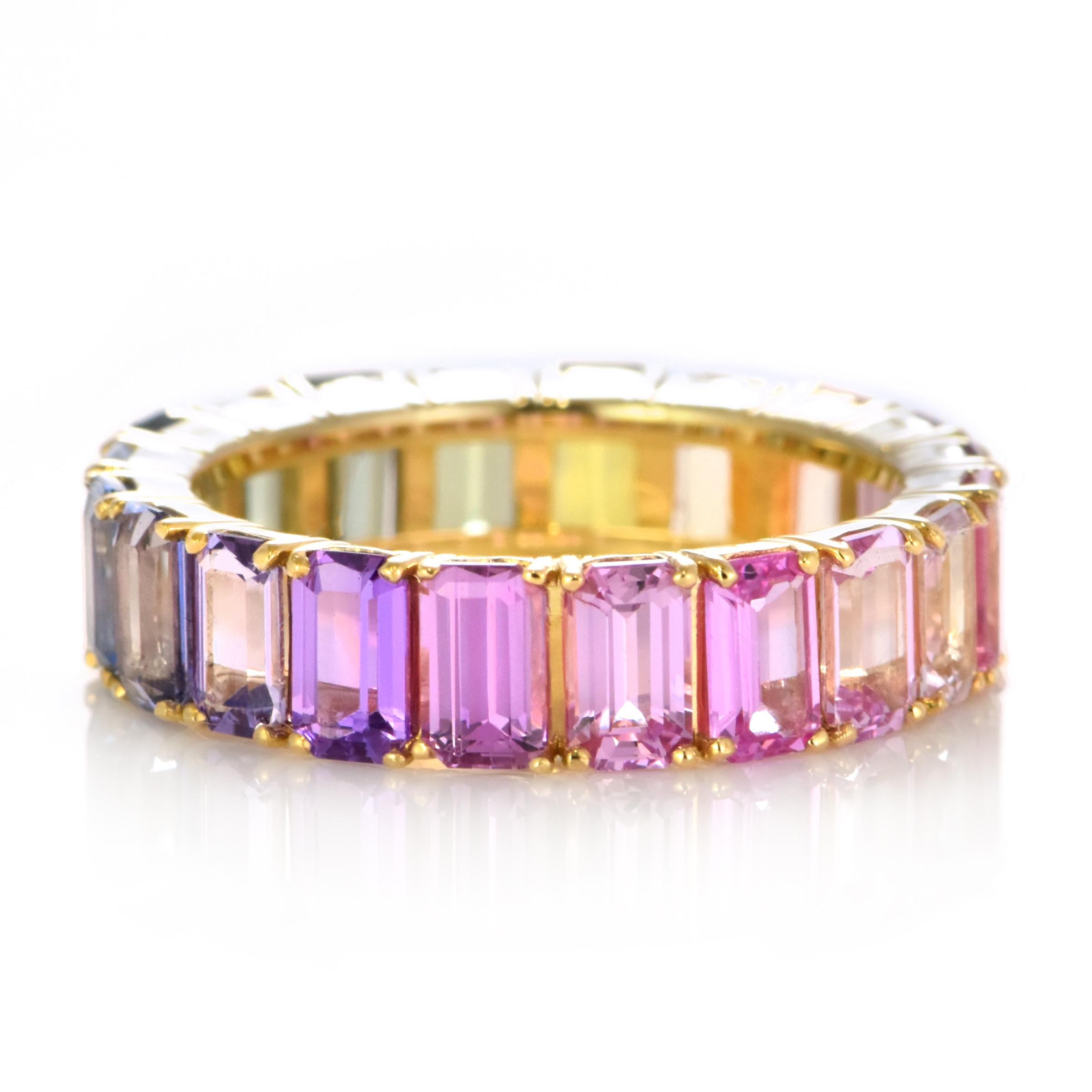 A beautiful ring featuring 6.86 Carats of Natural Multi Color Unheated Sapphires made in 18K Gold. Sapphires have extraordinary durability - they excel in hardness as well as toughness and durability making them very popular in jewelry.