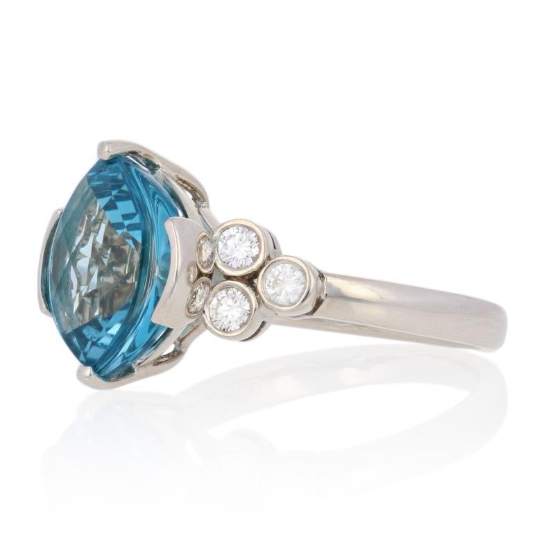 This ring is a size 8.

Metal Content: Guaranteed 14k Gold as stamped

Stone Information: 
Genuine Topaz
Treatment: Routinely Enhanced   
Color: Blue  
Cut: Fantasy
Carat: 6.50ct 

Natural Diamonds  
Clarity: SI2
Color: H - I  
Cut: Round