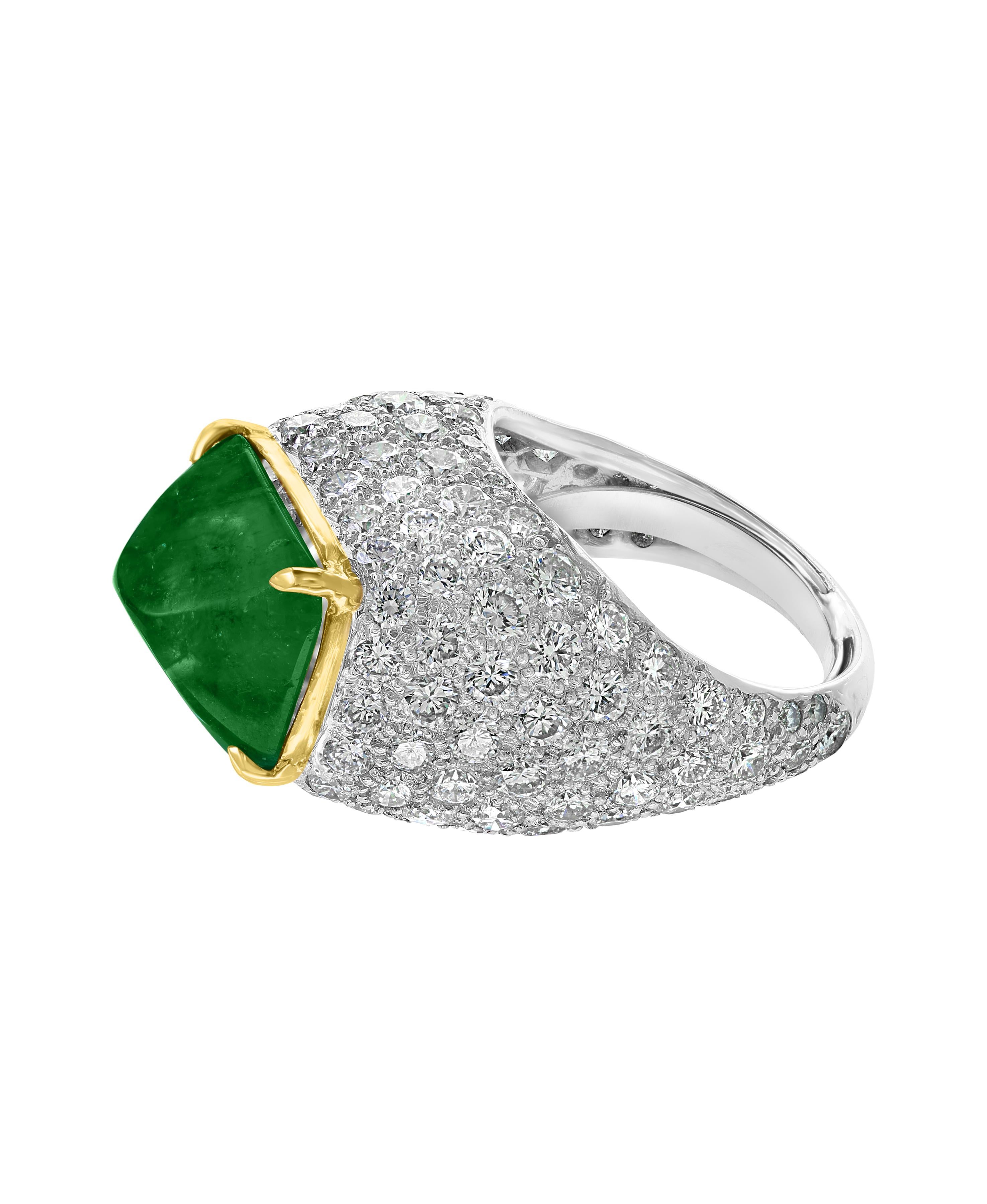 A classic, Unisex ring
Approximately 10 Carat  Colombian Emerald  Sugar Loaf Cabochon and 
approximately  10 Carats of Diamond Ring, Estate with no color enhancement.
 Diamonds: approximate 10 Carat 
Platinum 14 Grams
Emerald: 10 Carat 
GIA
