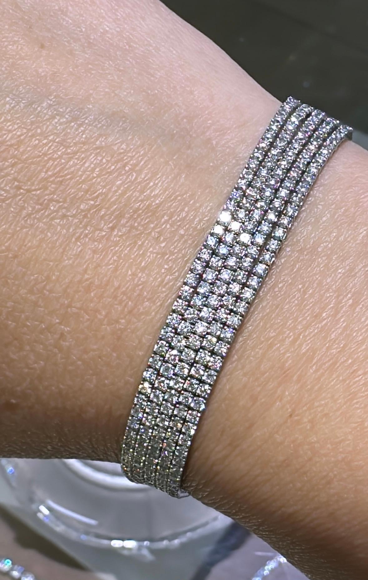 For those craving maximum sparkle, this indulgent tennis bracelet delivers. Five rows of sparkling diamonds clasp together for an ample layered look.
18K solid gold
532 near colorless diamonds
6.87carats
Box claps closure with safety latch
Length: 7