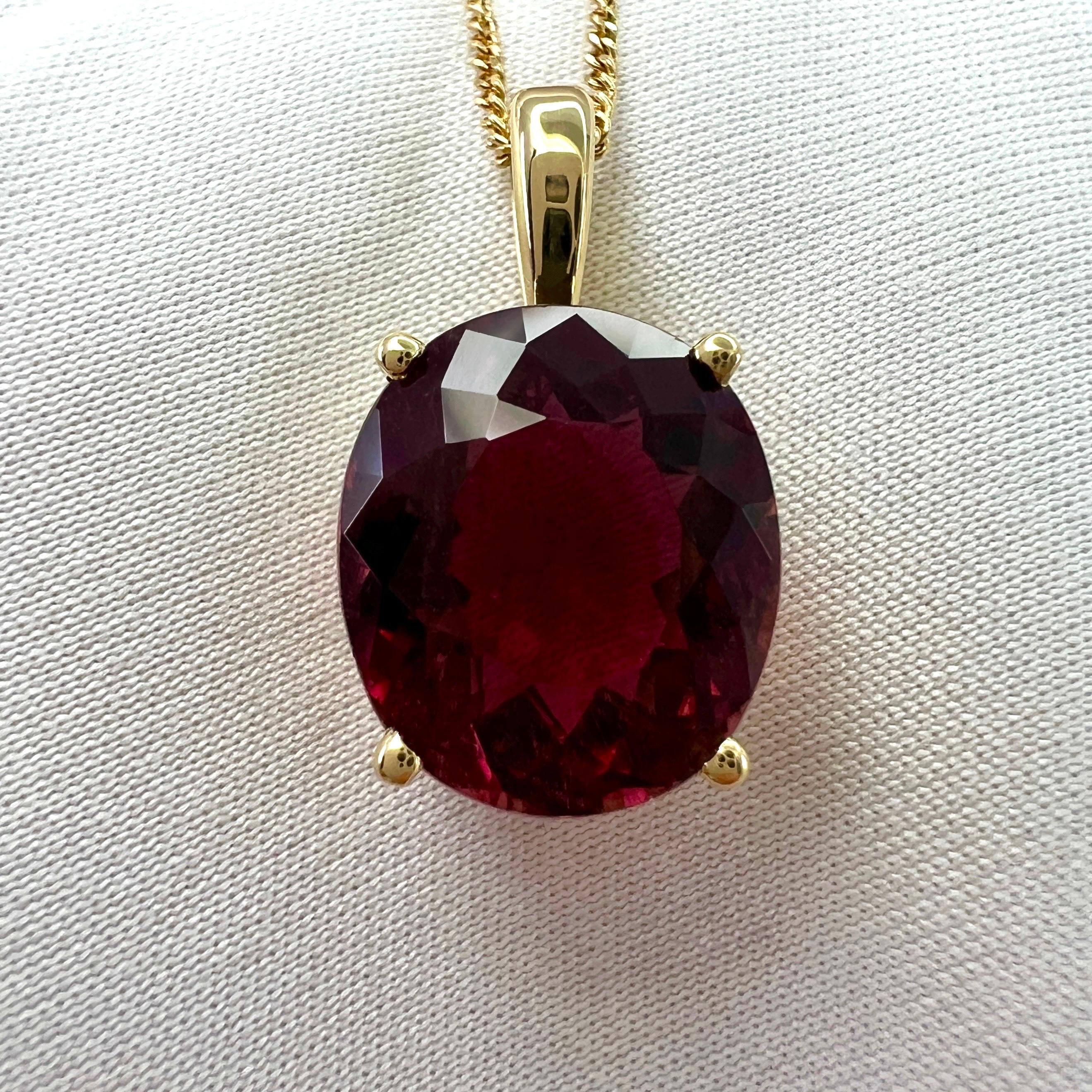 Fancy Oval Cut Pink Orange Rubellite Tourmaline 18k Yellow Gold Pendant Necklace. 

6.87 Carat rubellite tourmaline with a beautiful deep pink orange colour, very good clarity and an excellent fancy oval cut.
Set in a fine 18k yellow gold solitaire