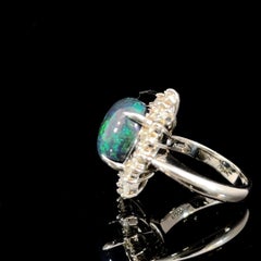 Anillo de cóctel de platino con diamante y ópalo negro de 6,88 quilates de Meghna Jewels