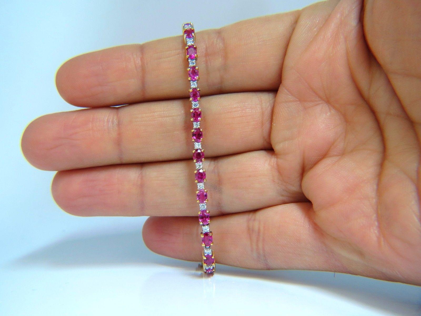 Oval Cut 6.88 Carat Bright Red Natural Ruby Diamonds Alternating Tennis Bracelet 14 Karat For Sale