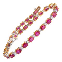 Bracelet tennis en alternance de rubis naturels rouge vif et diamants, 6,88 carats, 14 carats*