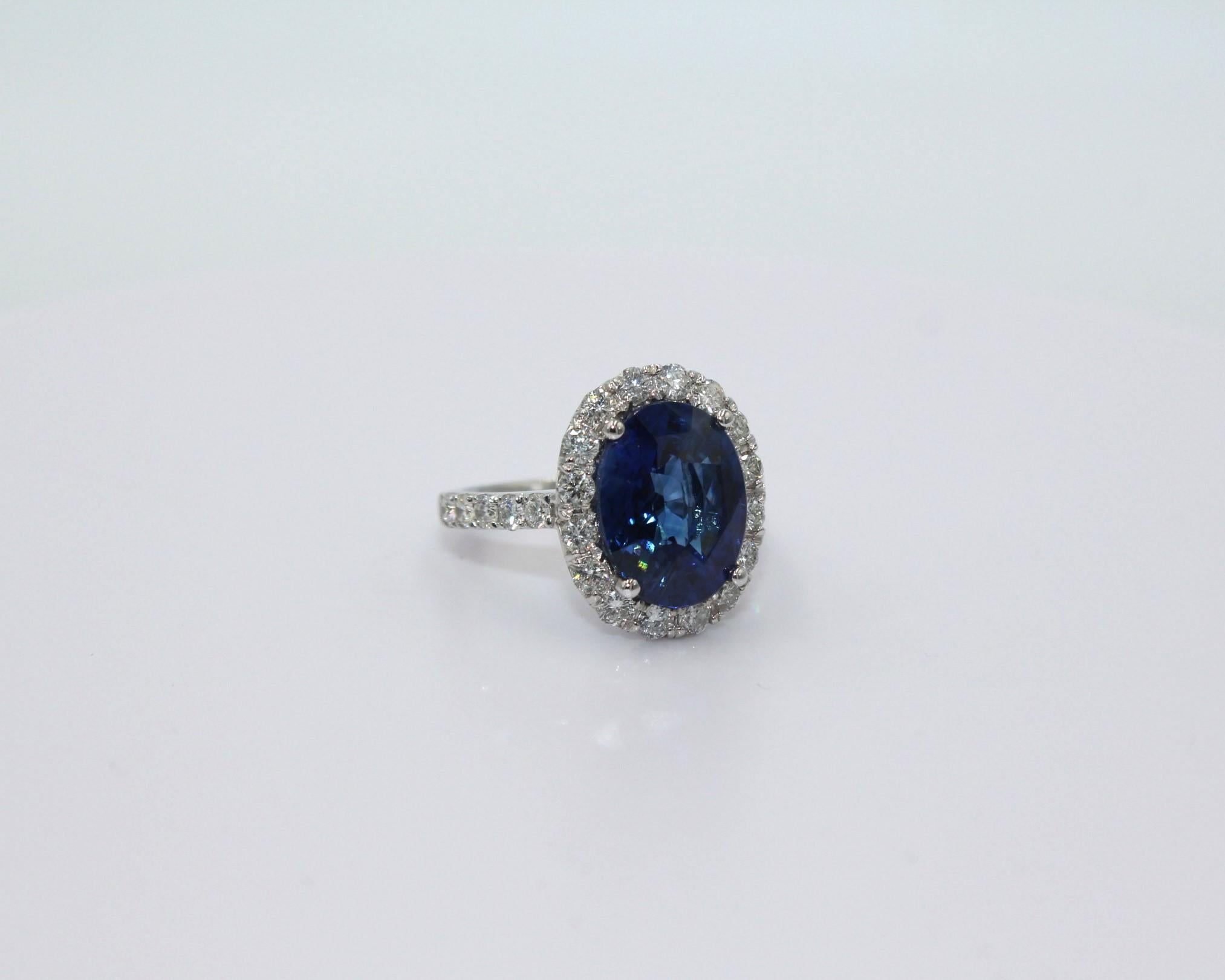 Oval Cut 6.89 Carat Sapphire & Diamond Ring For Sale