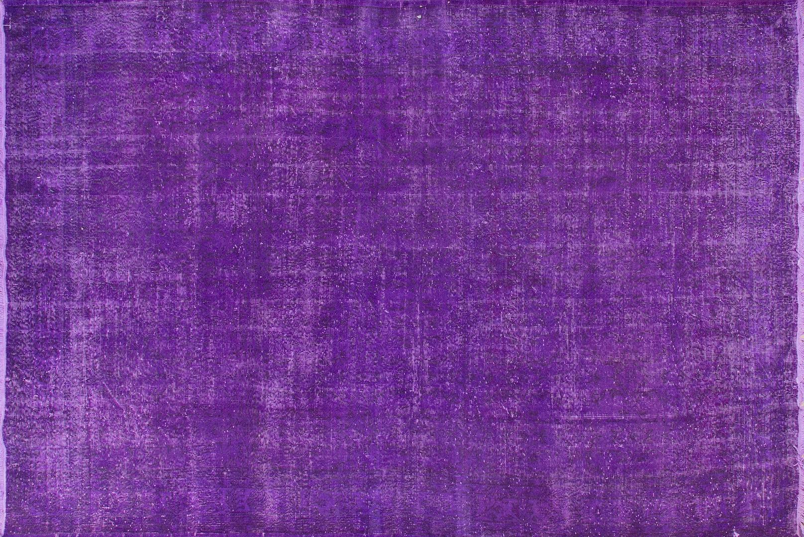 A vintage Turkish large rug re-dyed in purple color.
Finely hand knotted, low wool pile on cotton foundation. Deep washed.
Sturdy and can be used on a high traffic area, suitable for both residential and commercial interiors. Measures: 7 x 11 ft.