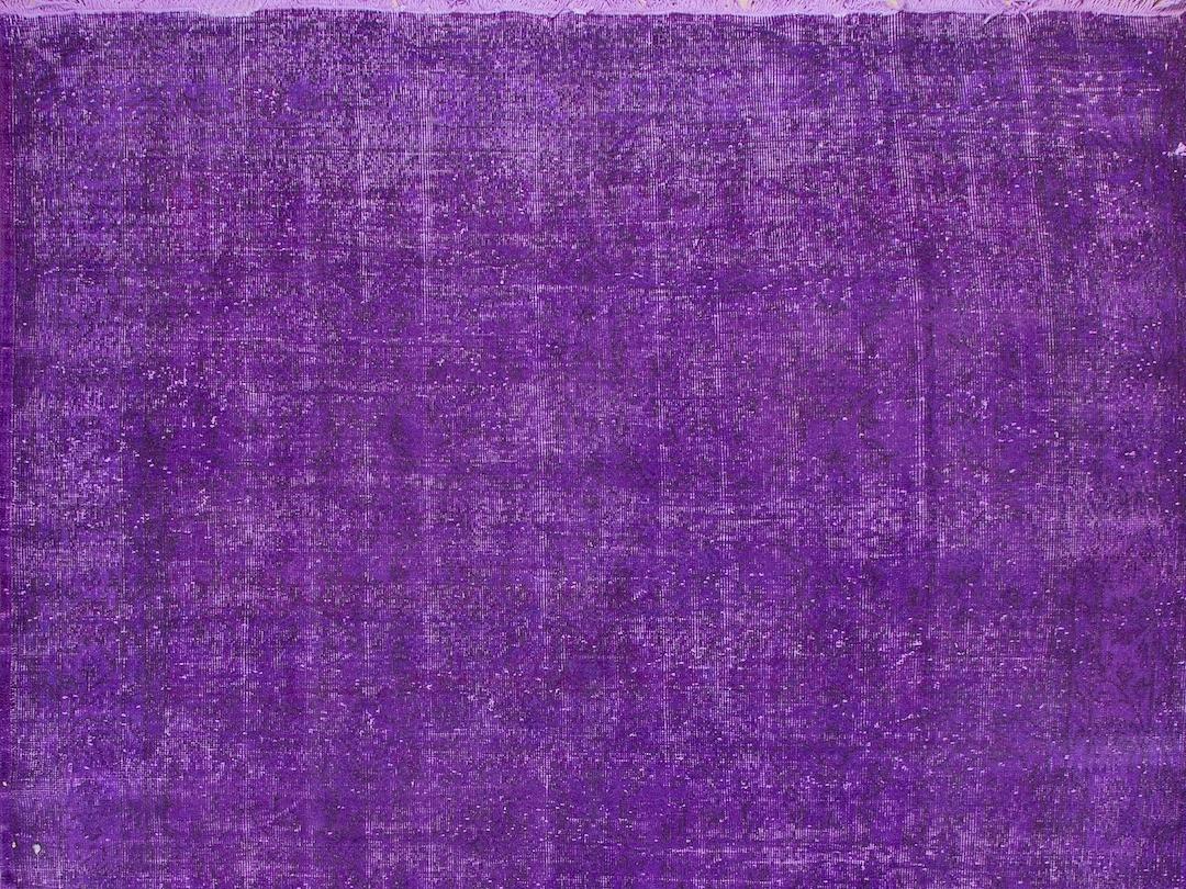 Turkish 6.8x11 Ft Vintage Handmade Wool Rug in Solid Purple for Modern Office and Home For Sale