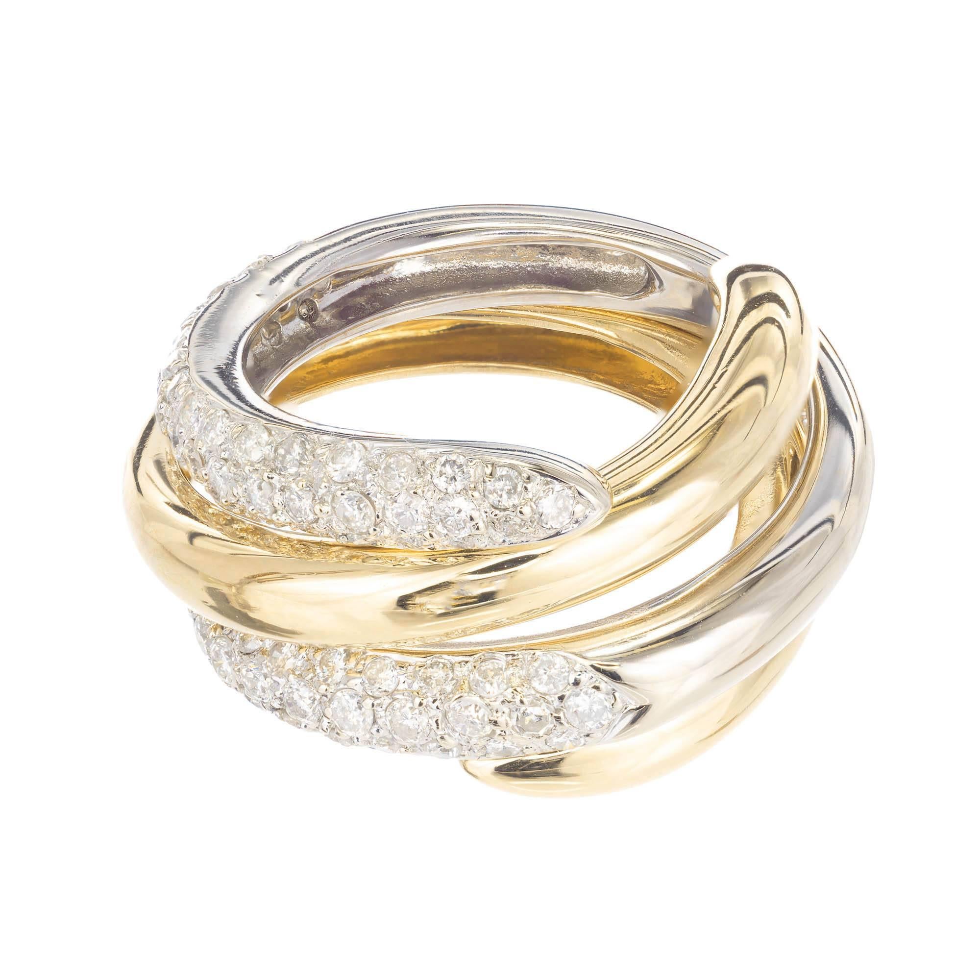 Two Tone gold Interlocking diamond swirl cocktail ring. Two rings that are on the spiral interlocking one is an 18k yellow gold high polish spiral. The second one is an 18k white gold diamond and pave set spiral on top. Rings can be worn together or