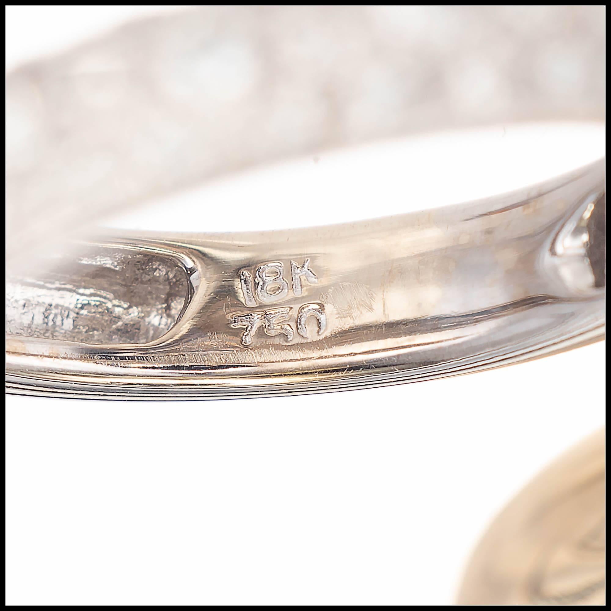Round Cut .69 Carat Diamond Interlocking Two-Tone Gold Swirl Cocktail Ring For Sale