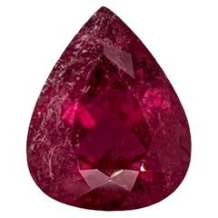 Pierre précieuse tourmaline rubellite de 6.9 carats  En forme de poire 14x11.3 mm  Pierre précieuse en vrac