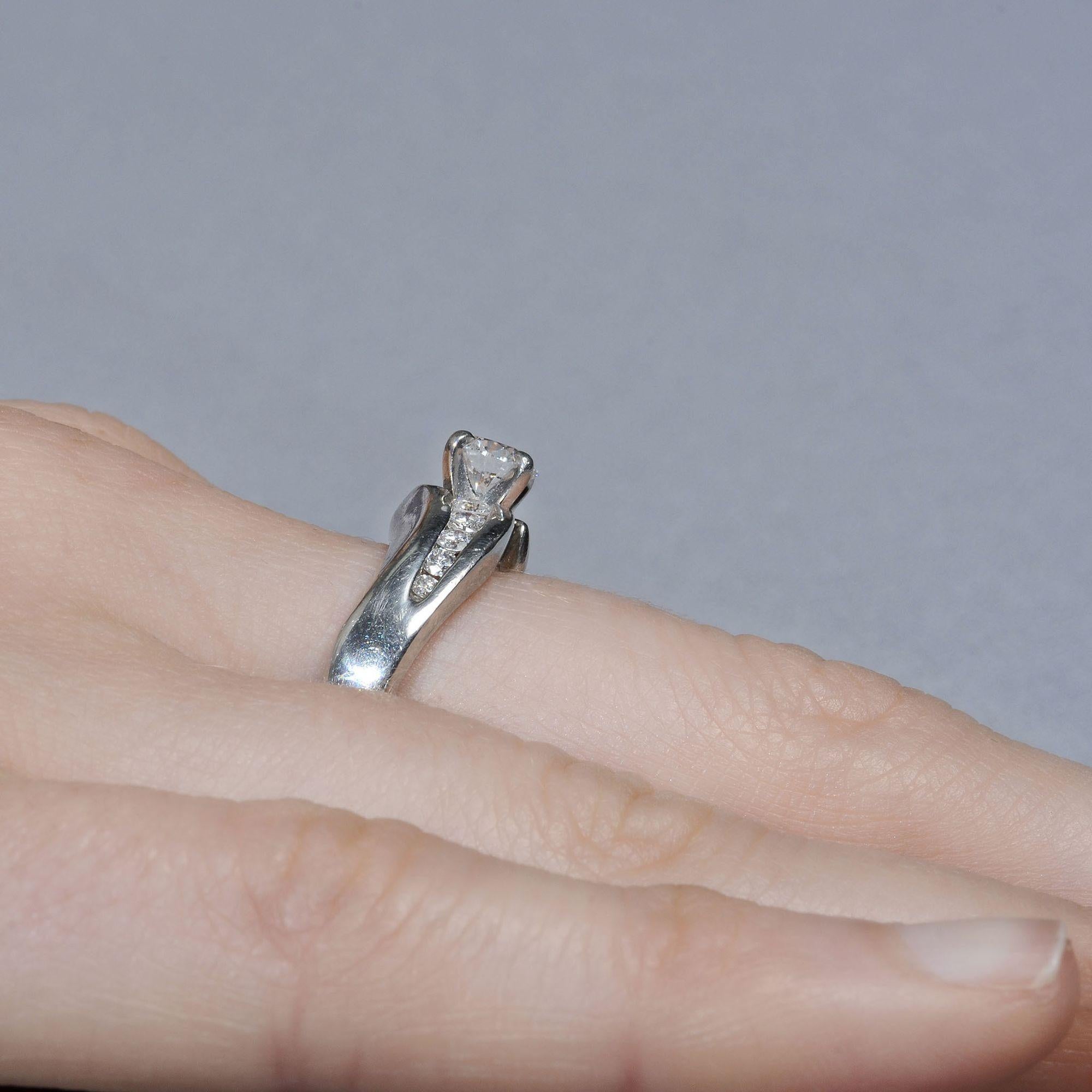 Brilliant Cut .69 Carat VS1 Center Diamond Platinum Engagement Ring For Sale