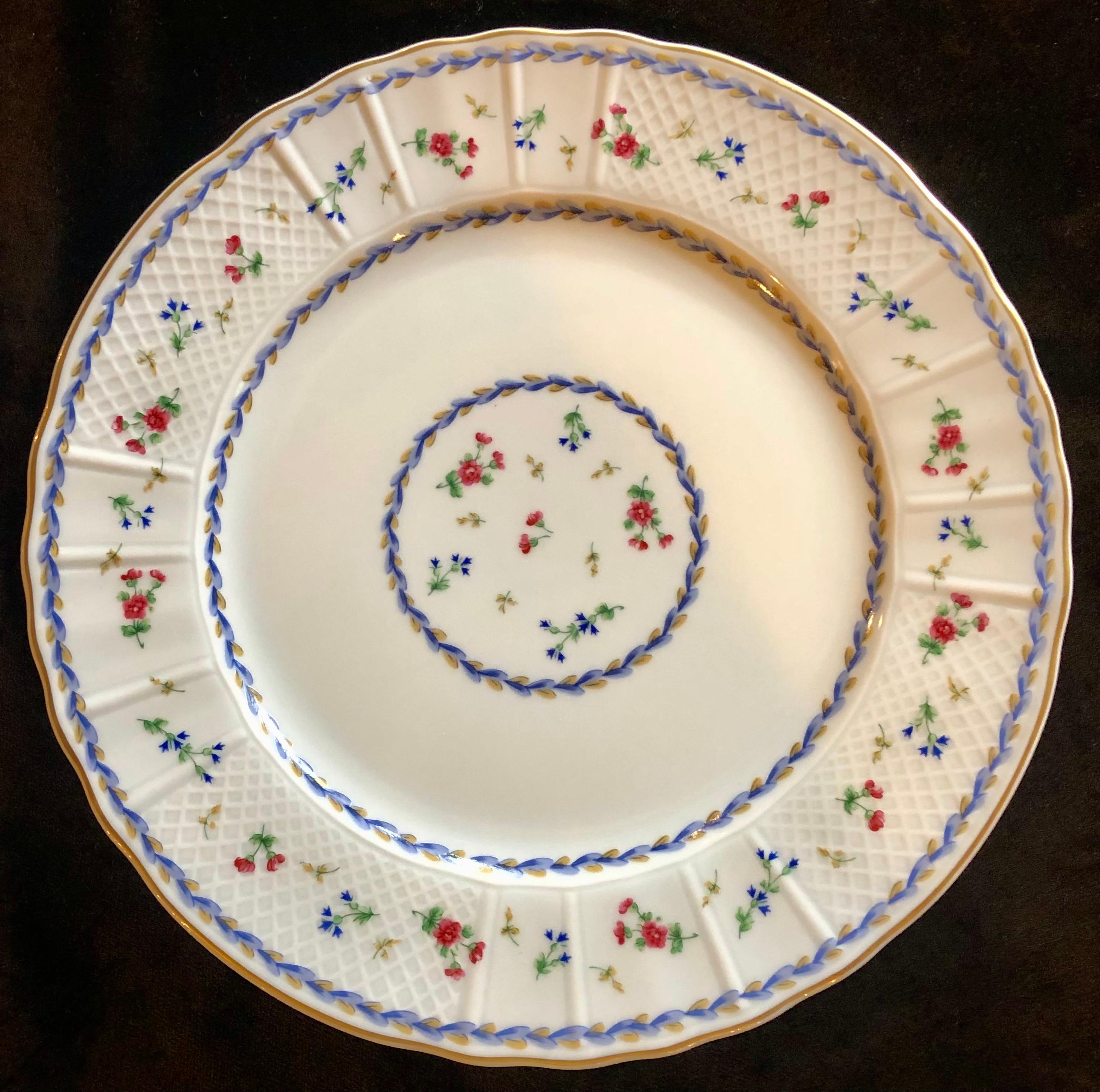 Bernardaud limoge Artois blue or green dinnerware with tea cups and saucers, (1974-2006)
Decorated with laurel wreath and flowers, gold rim on Versailles shape. This fine complete service for 11 (with extras) dinner set was discontinued in 2006.